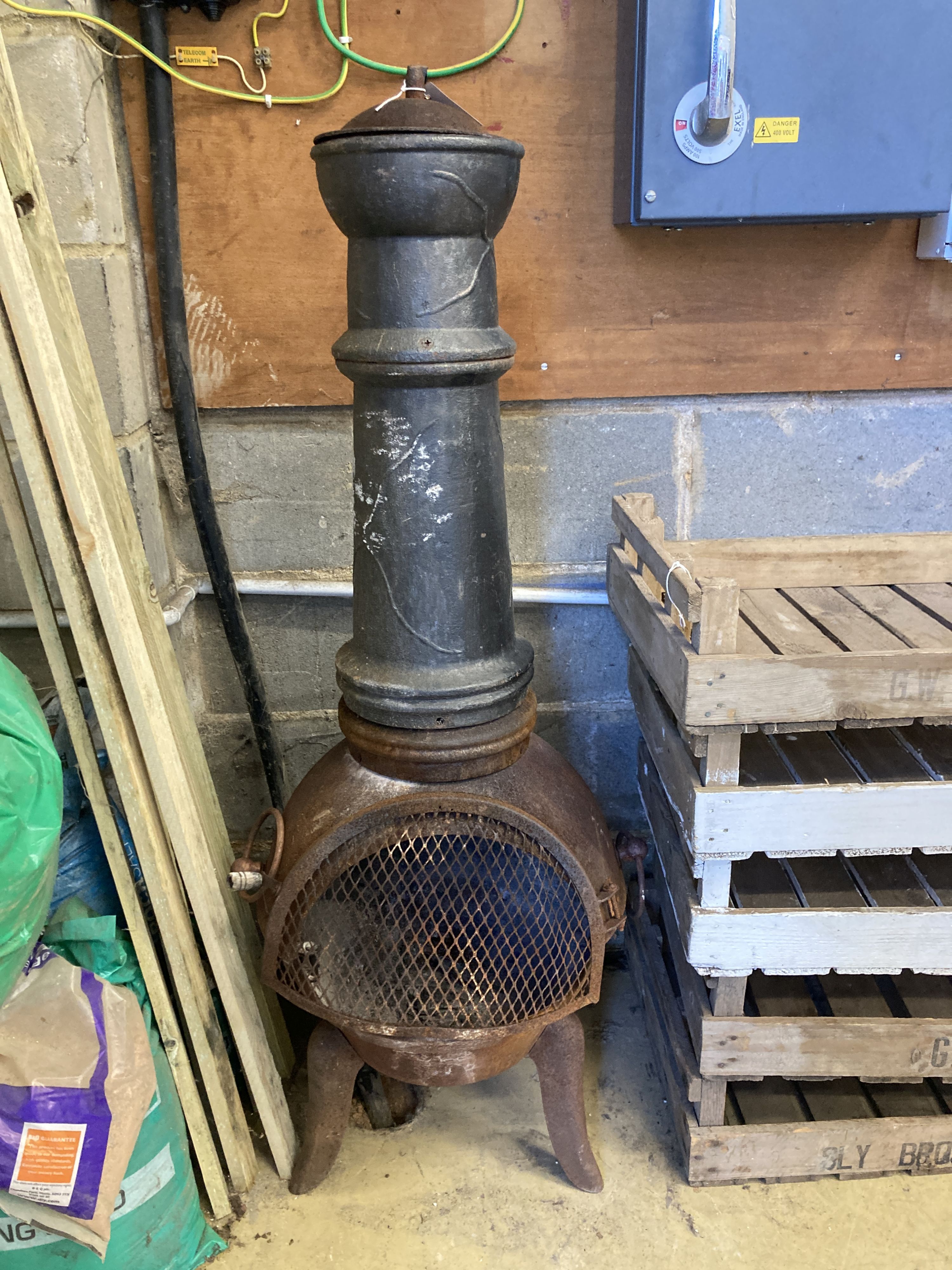 A garden cast iron chiminea, height 130cm